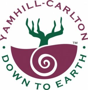 The purple and green graphic logo of the Yamhill-Carlton AVA of Oregon's Willamette Valley