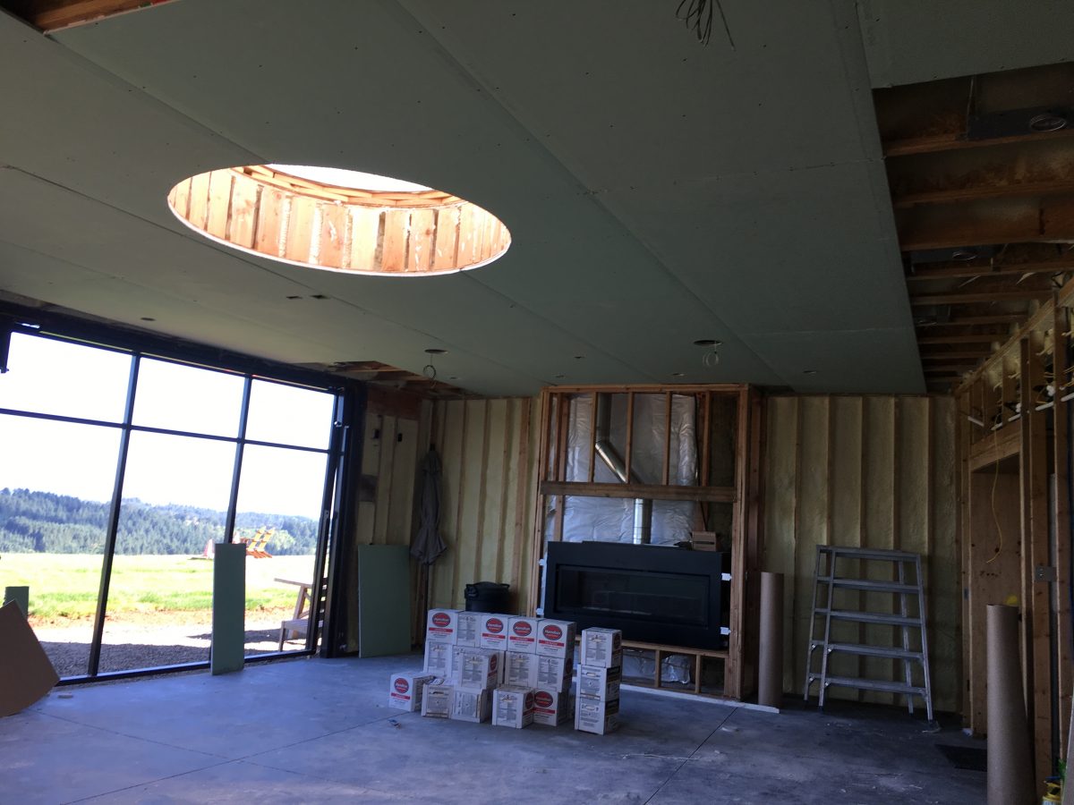Framing the curvature of the north exterior wall of Fairsing Vineyard