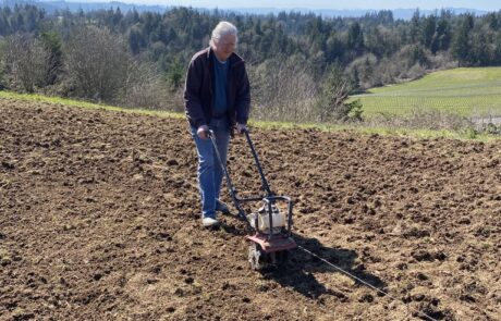 Prepping the soil near for fiber flax planting at Fairsing Vineyard