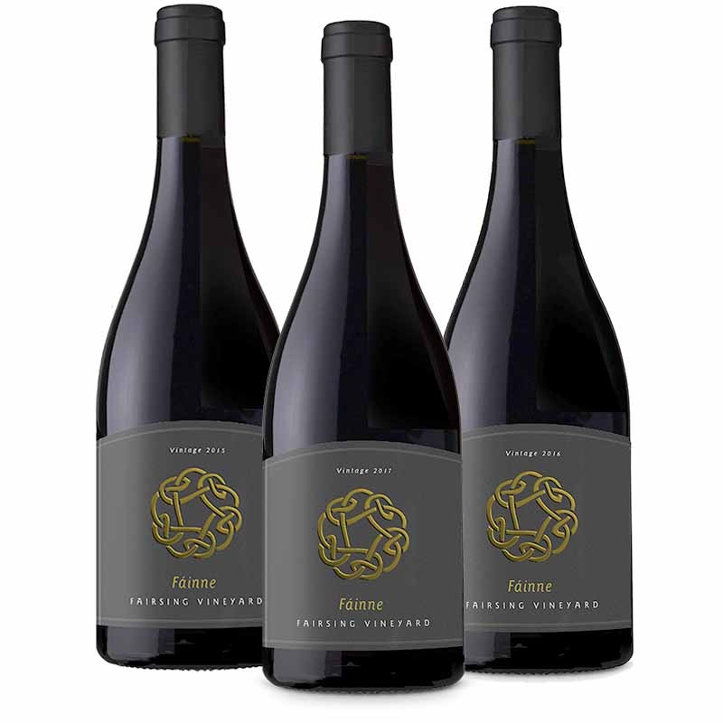 Three bottle celebration of the barrel select Fairsing Vineyard Fainne Pinot noir with gold Celtic knots on the label
