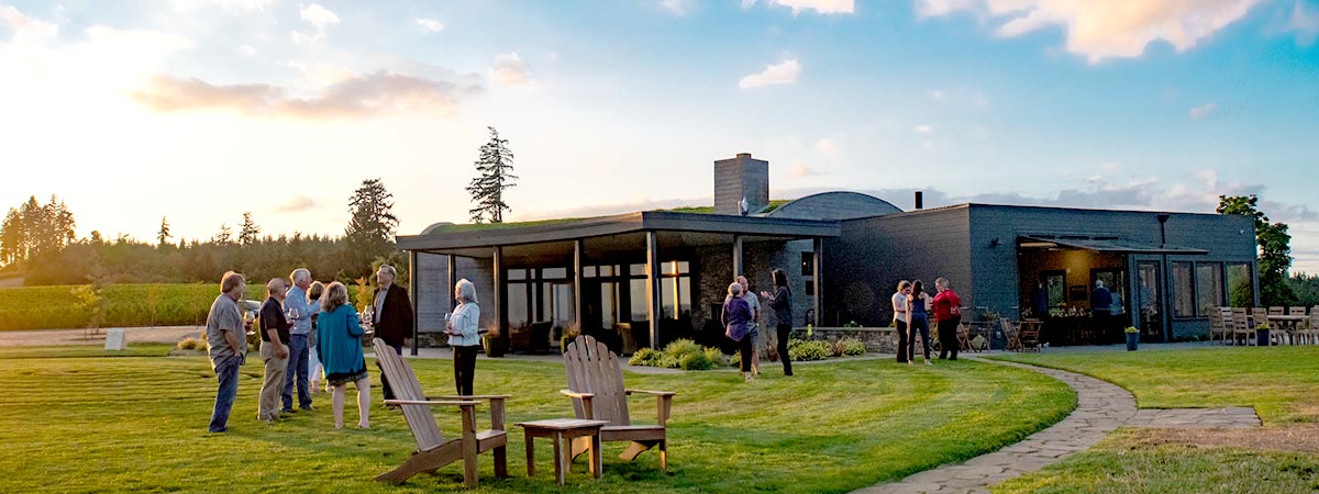 Wine Club members enjoy a sunset and wine at Fairsing Vineyard in Oregon's Willamette Valley