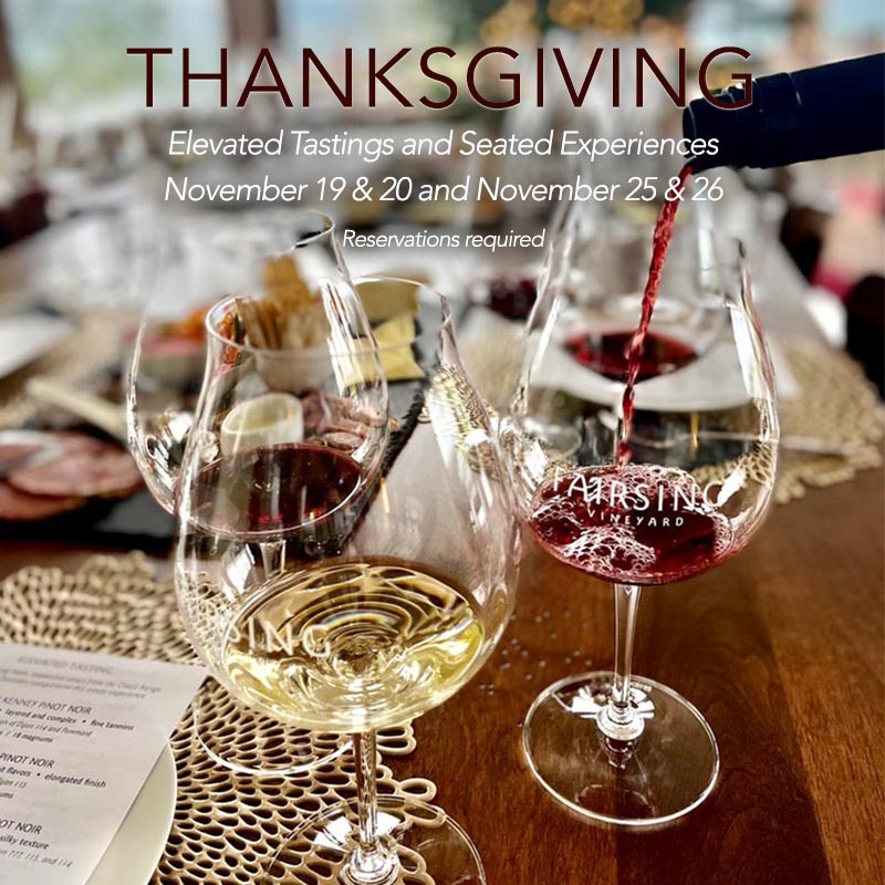 Fairsing Vineyard Pinot noir is poured into a logo glass on a long table with food and wine glasses in Oregon's Willamette Valley