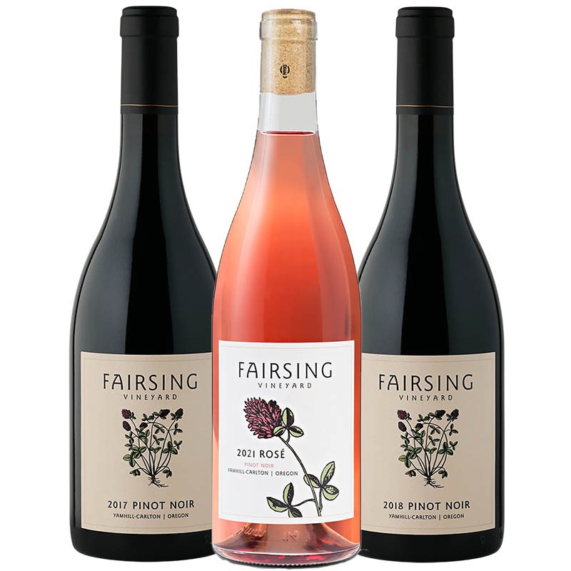 Three bottles of Fairsing Vineyard's flagship Pinot noir with Crimson clover on the labels