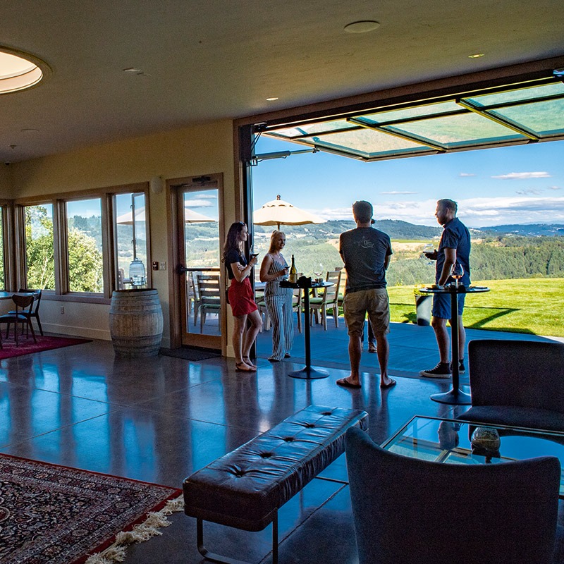 Fairsing Vineyard Guests enjoy the estate wines on the patio while enjoying sweeping views of the Willamette Valley