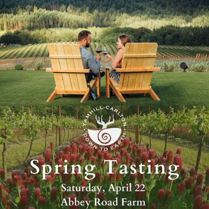 Oregon's Willamette Valley Yamhill-Carlton AVA annual Spring Tasting Saturday Aprill 22 at Abbey Road Farm with crimson clover and a couple drinking wine in wooden lawn chairs