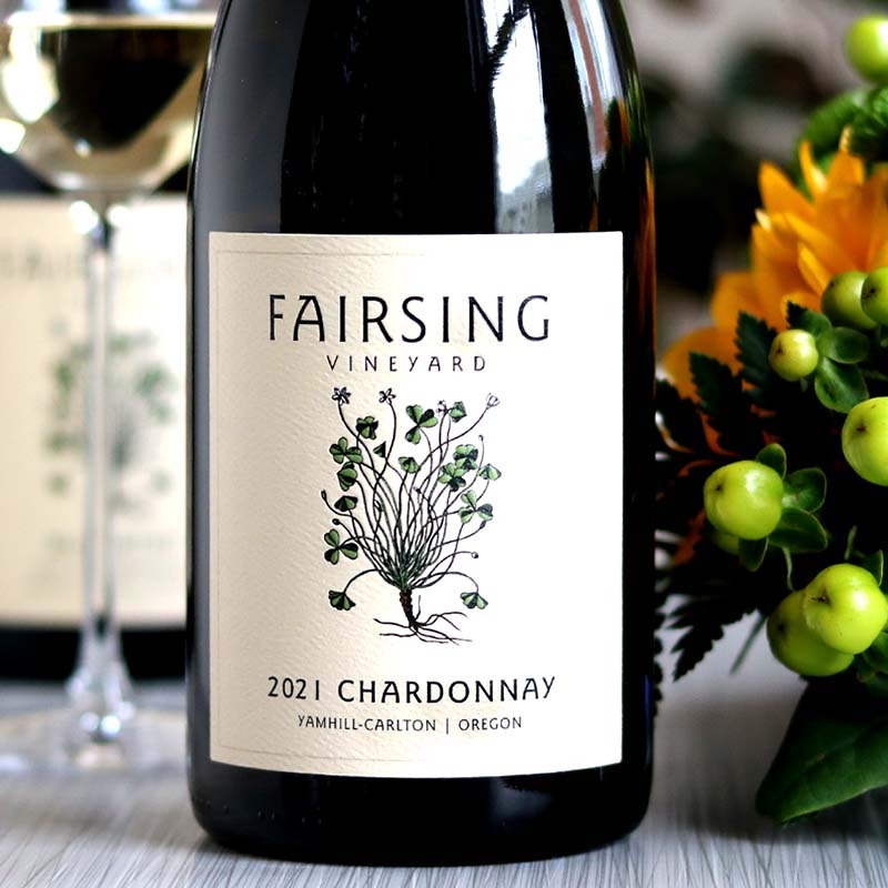 The 2021 Fairsing Vineyard Chardonnay with white clover of shamrock on the label 
