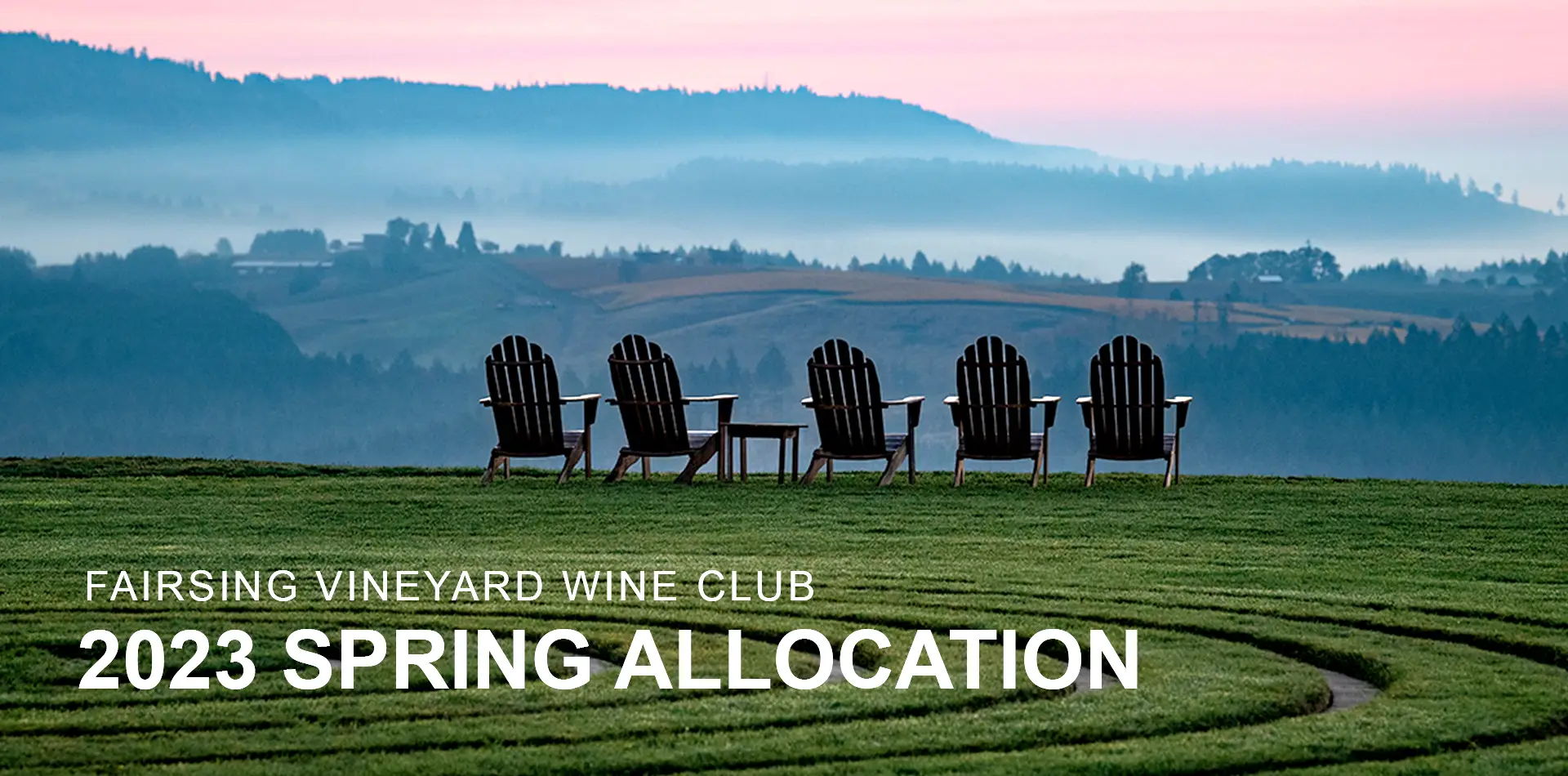 Adirondack chairs at Fairsing Vineyard great the dawn under a pink sky in Oregon's Willamette Valley